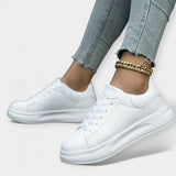 Chaussures de sport en cuir blanc