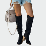 Bottes orthopédiques en cuir montantes jusqu'aux genoux