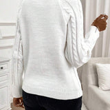 Clara – Pull en maille torsadée avec détails de boutons 