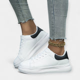 Chaussures de sport en cuir blanc