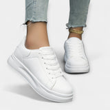 Chaussures de sport en cuir blanc