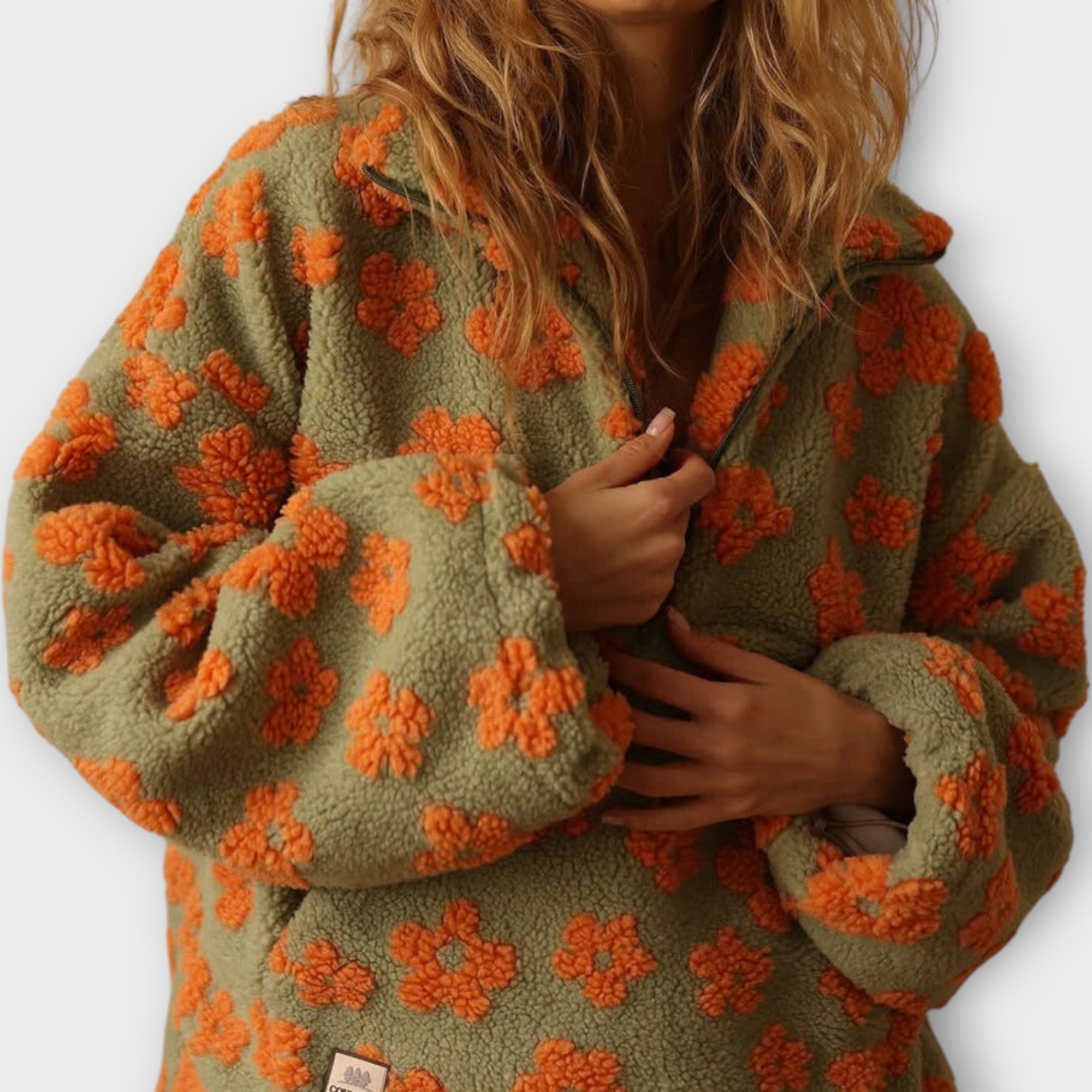 Kira – Pull en sherpa à motif marguerites