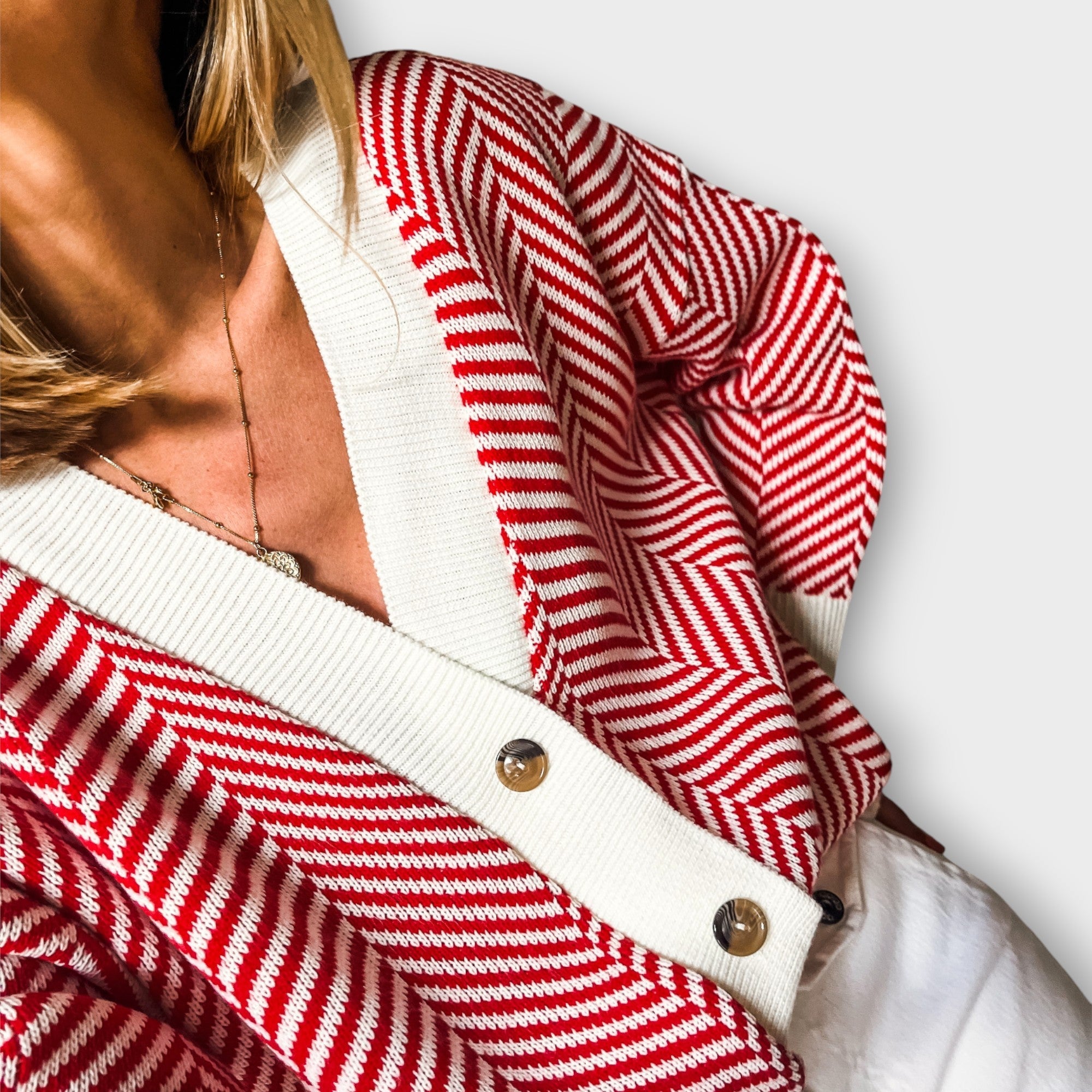 Gilet boutonné en maille chevron