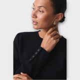 Gilet court moderne avec détails de boutons 