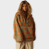 Kira – Pull en sherpa à motif marguerites