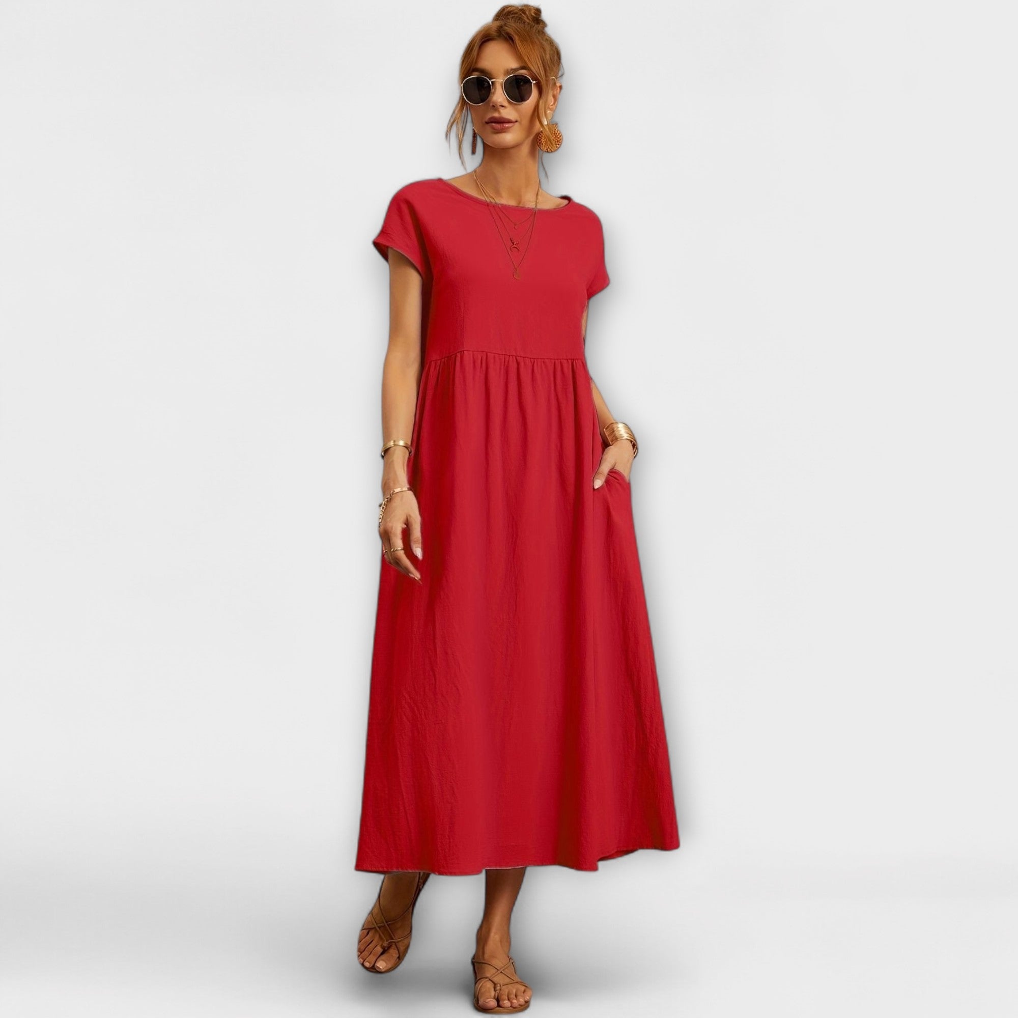 Robe midi à la ligne simple et poches latérales