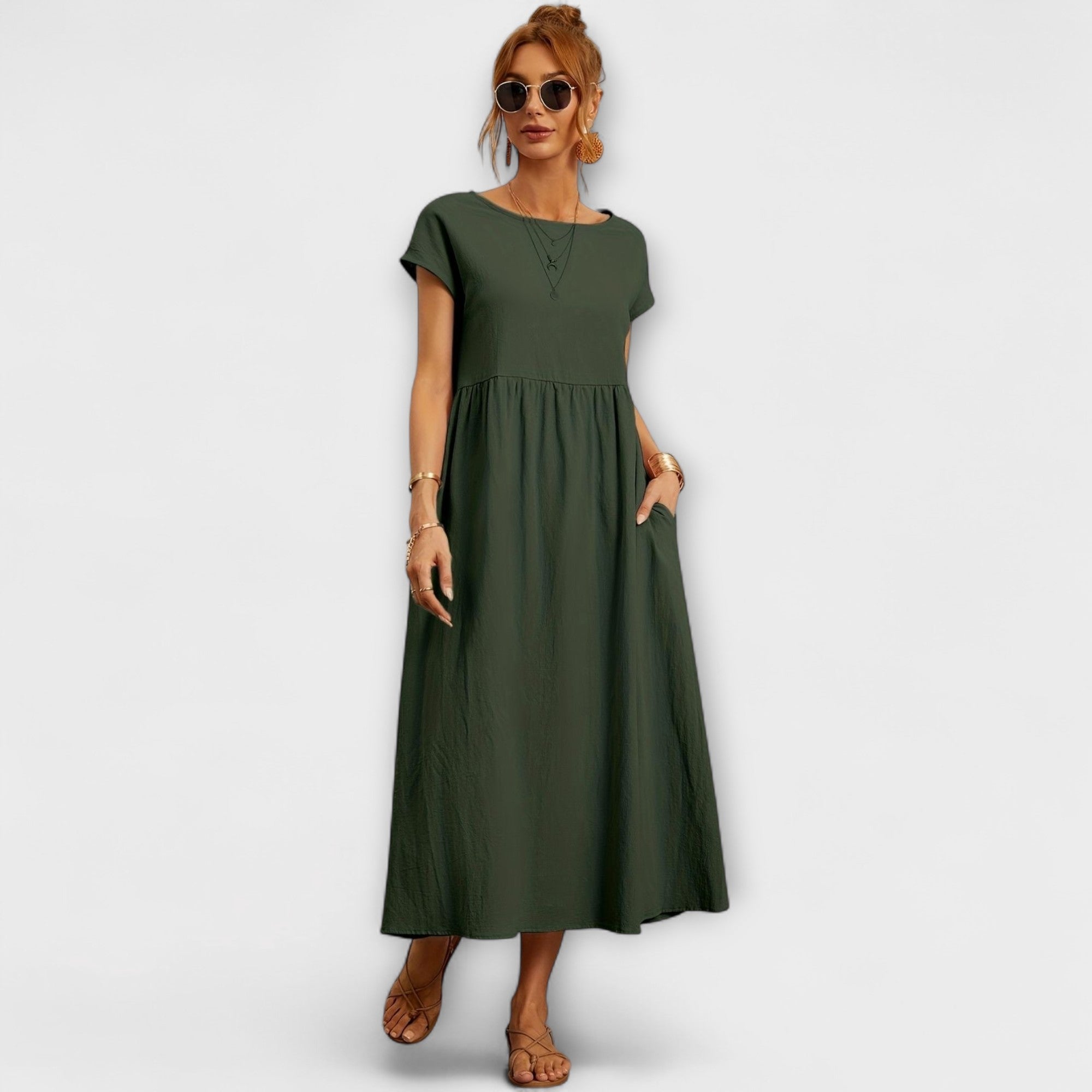 Robe midi à la ligne simple et poches latérales