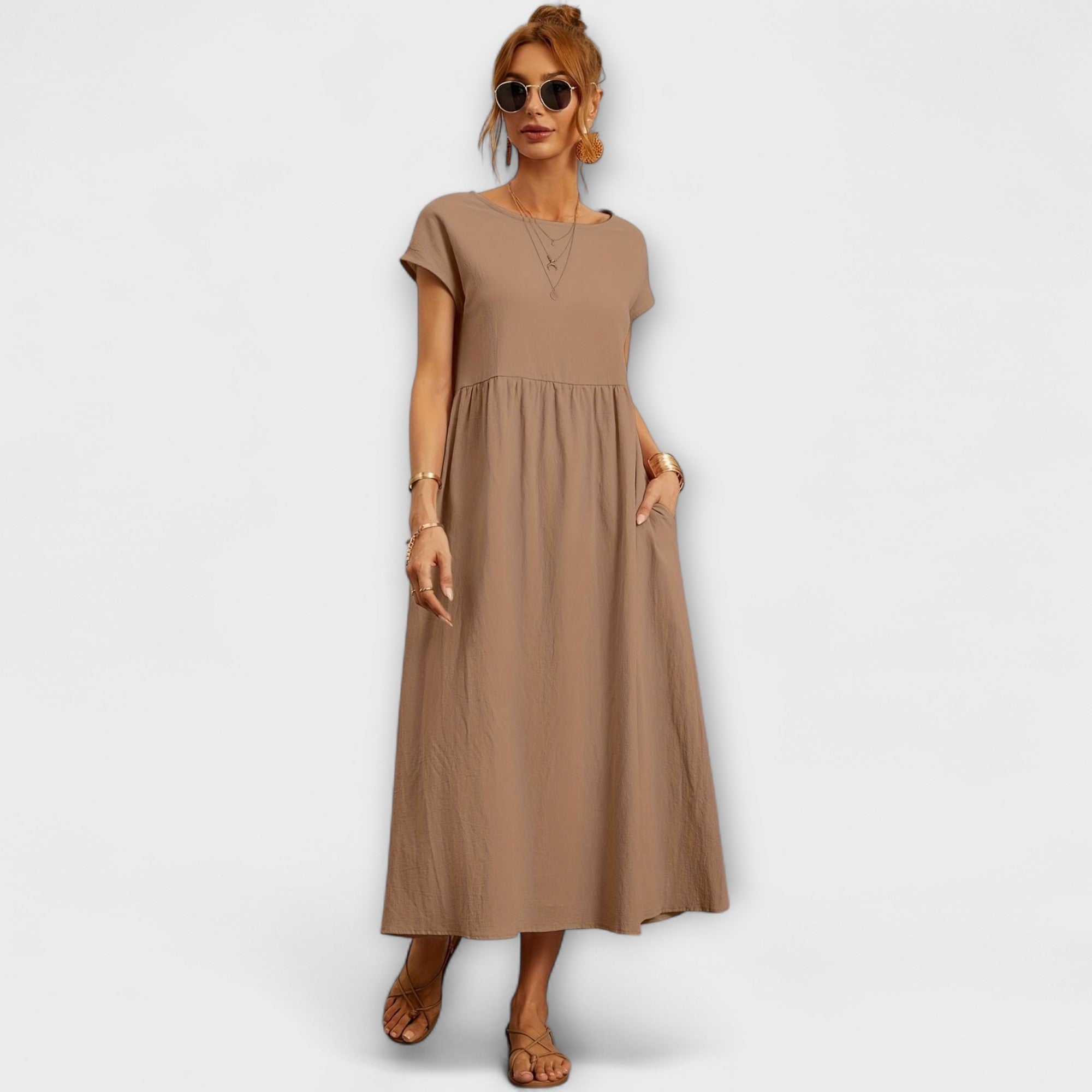 Robe midi à la ligne simple et poches latérales