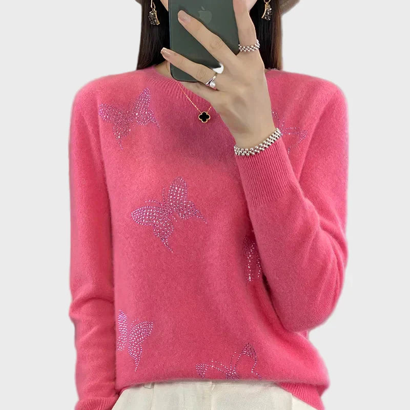 Col roulé tricoté à motif papillon