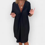 Robe élégante à col en V et ourlet décoratif