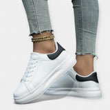 Chaussures de sport en cuir blanc